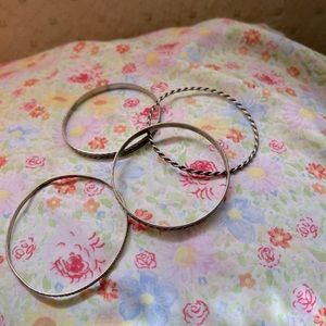 Set of 4 hand made Sterling silver bracelets